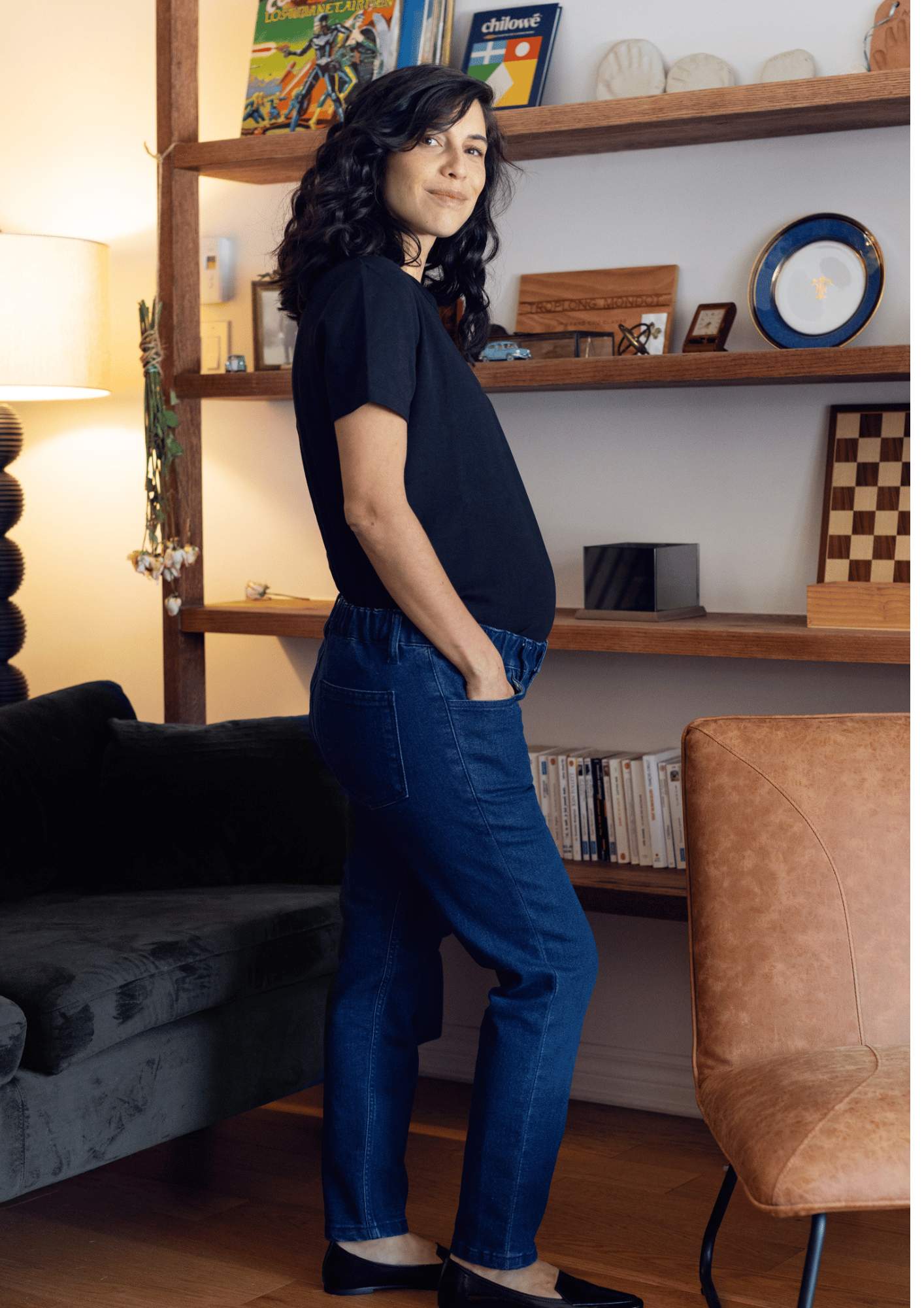 woman pregnant finding maternity clothes in a store in Toronto